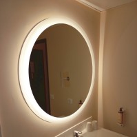 Round illuminated hotel mirror