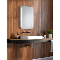 Mirror with rounded corners and vertical lines. LED lighting