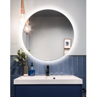 Round mirror with integrated backlighting for ambient lighting